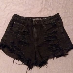 Black ripped shorts